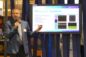 Alexander Zink, DRM Vice-Chair, presenting the latest technical updates on DRM and, on behalf of Fraunhofer, the latest developments from Fraunhofer IIS.
